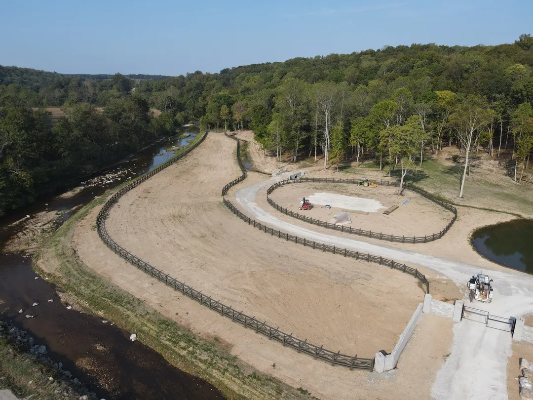 Graded riding track and arena earthwork seen from above